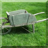 L07. Antique wheelbarrow. 24” x 69”  